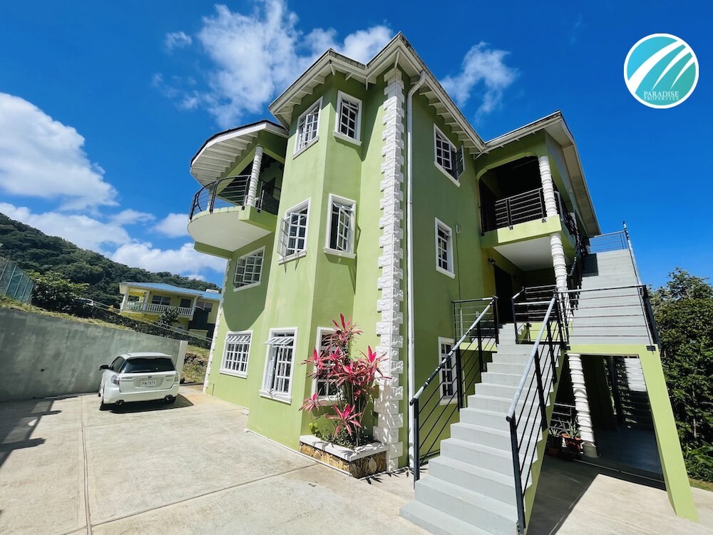 St Lucia real estate for sale: 2 apartment buildings with 25 bedrooms, parking and large lot 
