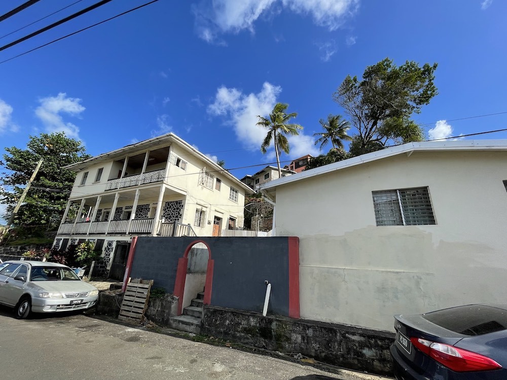 St Lucia real estate for sale: 2 story building with cottage opposite Port Castries 
